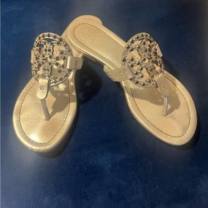 Tory Burch silver sandals with rhinestones.